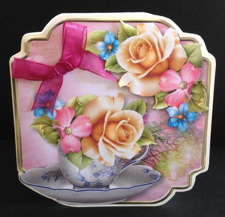 Teacup, Saucer & Yellow Summer Roses by Ulla Skraedderdal