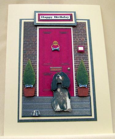 King Charles Spaniel with a Red Door by Valerie Cuthbertson