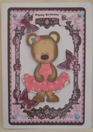 Cute Little Bear in Pink Dress on Lace Frame by Valerie Cuthbertson