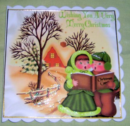 Snow Scene with Cottage and Carol Singers by Valerie Cuthbertson