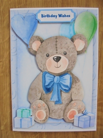 Lovely Teddy Blue with presents  by Valerie ODonnell