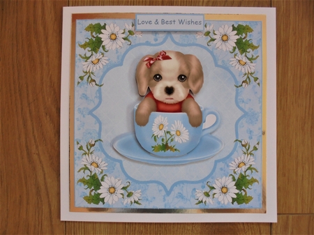 Puppy in a Cupsie Daisy by Valerie ODonnell