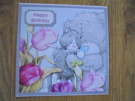 Tatty teddy with cat tiptoe throught the tulips by Valerie ODonnell