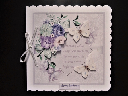 Mixed flowers and butterfly by Valerie Spowart