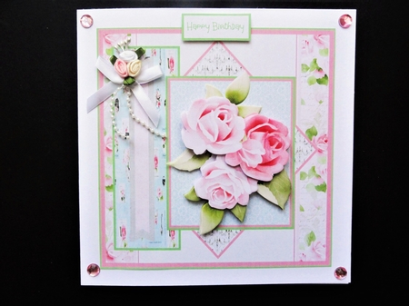 Rose cluster by Valerie Spowart