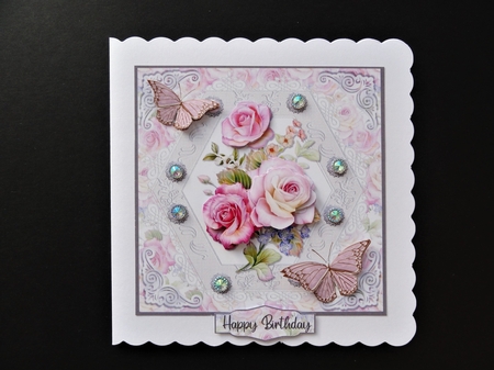 Rose petal wishes by Valerie Spowart