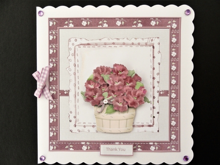 Tub of purple flowers by Valerie Spowart