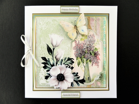 Vase of flowers and butterfly by Valerie Spowart