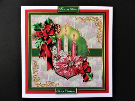 Christmas candles and poinsettias by Valerie Spowart