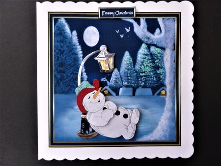 Snowman having a nap by Valerie Spowart
