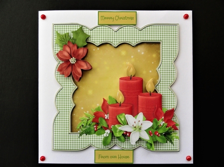 Red candles and poinsettia by Valerie Spowart