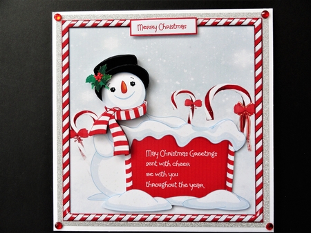 Snowman and candy cane by Valerie Spowart