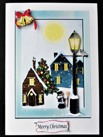 Winter houses, Christmas tree in frame with lamp post by Valerie Spowart
