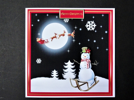 Sledging snowman by Valerie Spowart