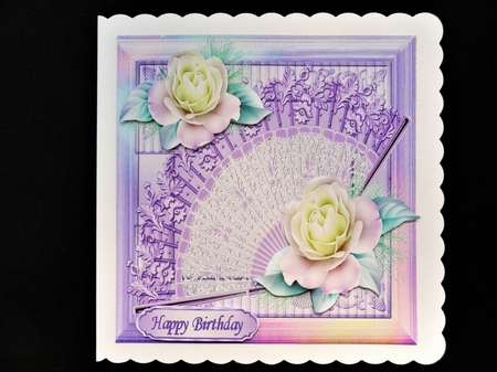 Pretty lace fan with beautiful lilac roses in lilac rainbow frame 8x8 by Valerie Spowart