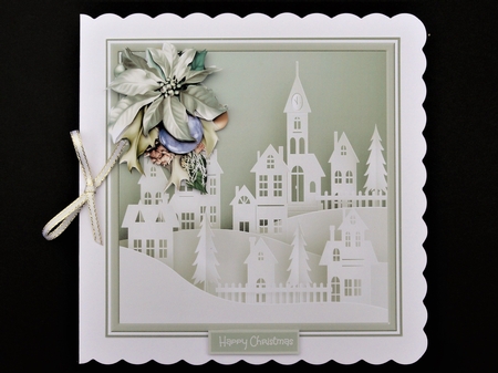 Christmas poinsettia and town by Valerie Spowart
