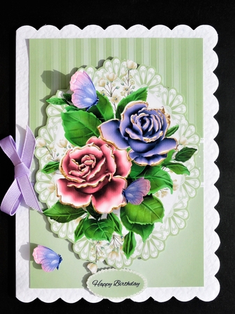 Lovely pink and lilac rose topper by Valerie Spowart
