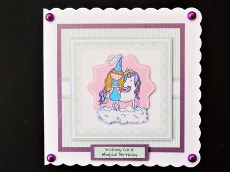 Princess sitting on a unicorn birthday topper by Valerie Spowart