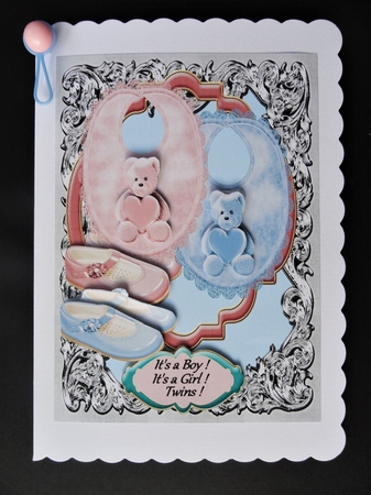 baby twins a boy and a girl by Valerie Spowart