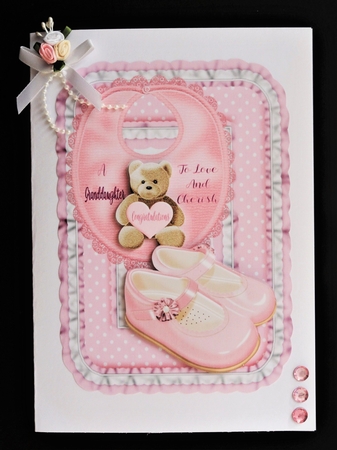 A baby boy and a baby girl toppers grandparents by Valerie Spowart
