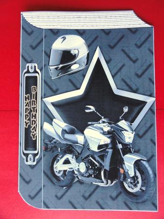 Motorbike with Helmet on a Book A4 by Valerie Spowart