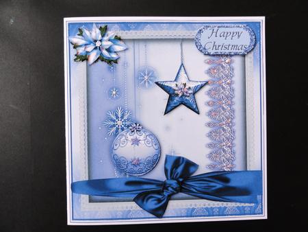 Ice Blue Poinsettia and Baubles Topper by Valerie Spowart
