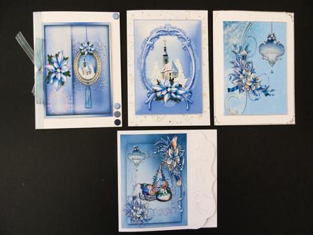 Selection of Four Blue Christmas Toppers by Valerie Spowart