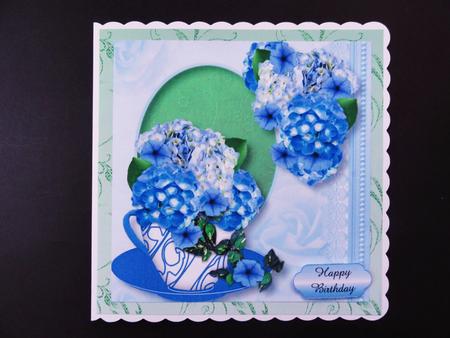 Beautiful Blue Hydrangeas in a Teacup by Valerie Spowart