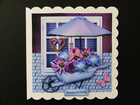 Wheelbarrow with Flowers by Valerie Spowart