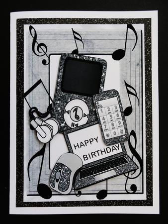 Silver Laptop with Matching Mp3 Player and Mobile Phone by Valerie Spowart