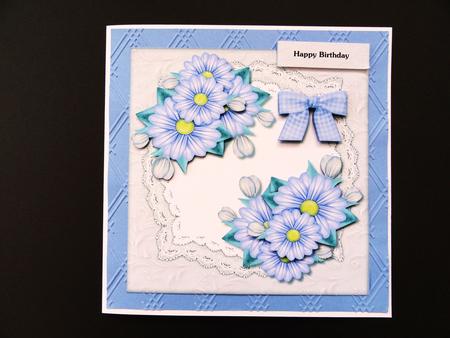 Pretty Bleu Flowers on Lace Topper by Valerie Spowart