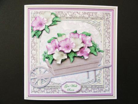 Barrow of Pink and Cream Flowers Card Front by Valerie Spowart