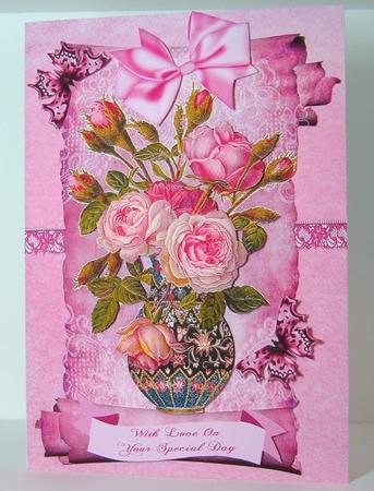Vase of Roses on a Scroll by Valerie Swinglehurst