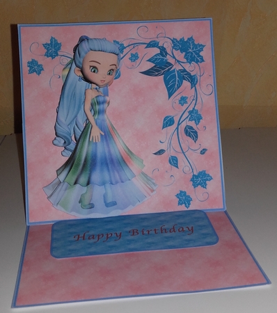 Cute Cookie Character Girl in a Blue Multi Color Gown Poser Graphics  by Wanda Lipski
