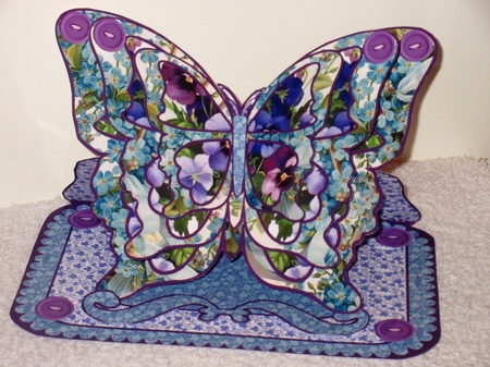 Butterfly easel Pansies and forget-me-nots by Wayne Swan