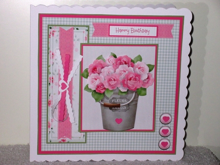 A bucket full of roses by Wayne Swan