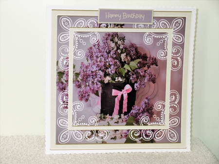Pot of lilacs by Wayne Swan