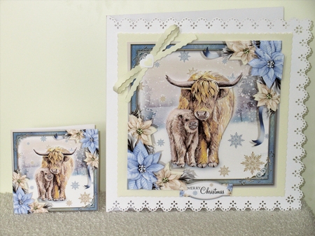 The Christmas Highland Cows by Wayne Swan