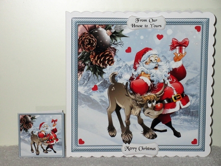 Santa Giving Rudolph His Gift by Wayne Swan