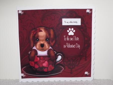 Pup in a Cup by Wayne Swan