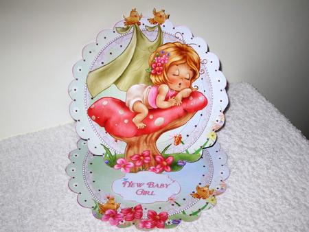 Baby Girl on a Toadstool Scalloped Round Easel Card by Wayne Swan