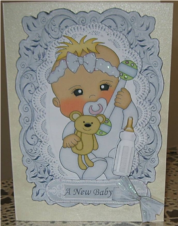 Baby Girl in Silver on Lace with Her Teddy & Bottle by Wendy De Winter