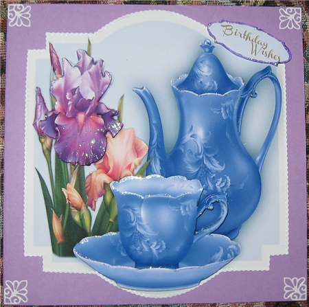Lilac Irises and a Cup of Tea  by Wendy De Winter