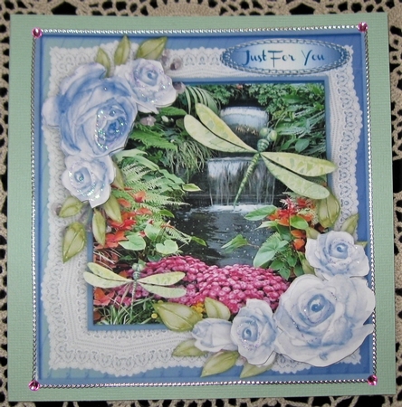 Beautiful Green Dragonflies and Blue Roses  by Wendy De Winter