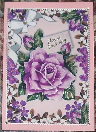 Pretty lilac roses with diamante bow in flower frame by Wendy De Winter