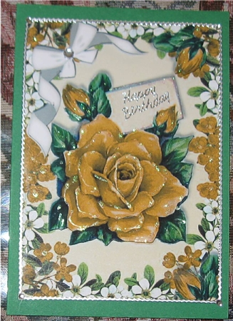 Pretty gold roses with diamante bow in flower frame by Wendy De Winter