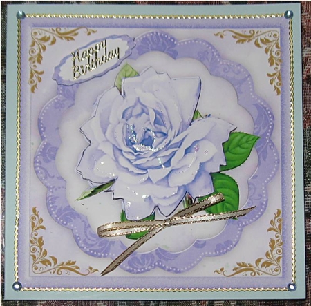 Beautiful Blue Rose on a scalloped mat  by Wendy De Winter