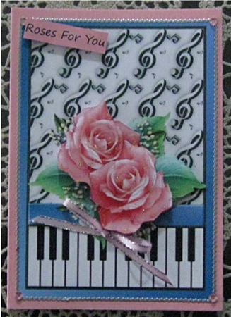 Peach Roses on Keyboard and Music by Wendy De Winter