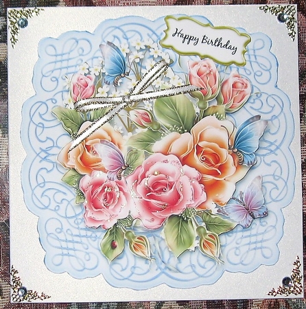 Lovely butterflies and flowers on a scrollwork mat by Wendy De Winter