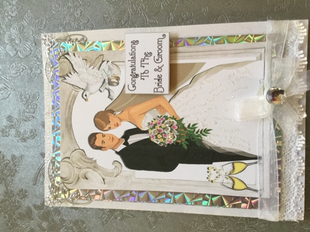 Wedding couple with Arch & Dove A5 by Wynona Oneil